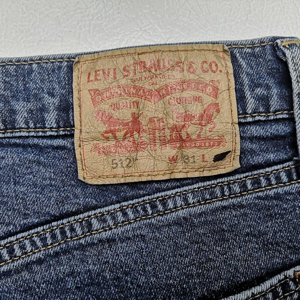 Levi's 512 Men's Size 31 Waist Narrow Leg Medium Wash Blue Jeans